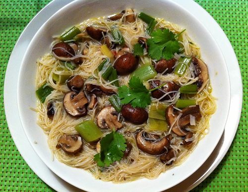 Rice noodle soup with mushrooms
